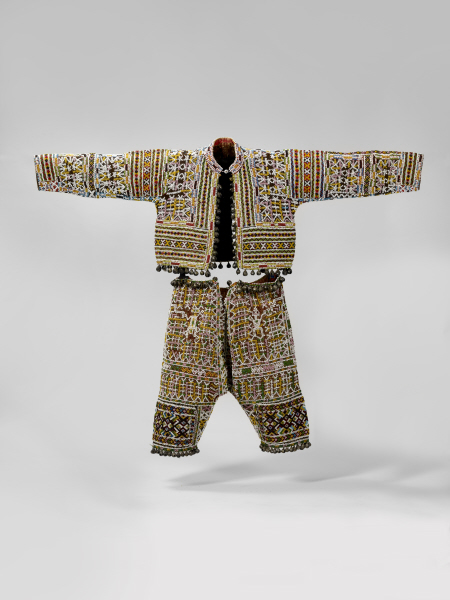Trouser and jacket, Philippines, decorated glass beads and embroidered with bells at the waist and bottom. Musée du quai Branly