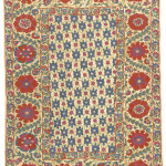 Small suzani or sandalipush, Uzbekistan, 19th century. 154 x 108 cm. A number of these smaller suzanis are known with fields filled with small blue irises. See pl.8 in Vok Suzani 1