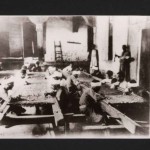 Photograph showing artisans at work at Dar al-Kiswah; 8.8 x 12 cm
