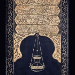 Sitarah for the minbar of the Meccan Sanctuary, with the name of King Faruq of Egypt Cairo, dated AH 1365 (1946 AD); dark-blue silk, with beige silk appliqués, embroidered in silver and silver-gilt wire over padding, 212 x 125 cm