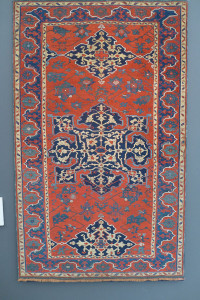 Star Ushak rug, west Anatolia, 16th century. This is a rare small format Star Ushak that has been published a number of times that exhibits all of the elements seen in the large carpets dating from the early 16th century such as the blue floral tracery int he field and the golden arabesques in the medallions. Gallery Moshe Tabibnia