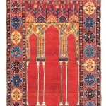 Lot 13 THE BERNHEIMER COUPLED-COLUMN PRAYER RUG WEST ANATOLIA, MID 17TH CENTURY 5ft.1in. x 3ft.7in. (155cm. x 108cm.) £50,000-80,000