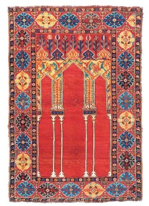 Lot 13 THE BERNHEIMER COUPLED-COLUMN PRAYER RUG WEST ANATOLIA, MID 17TH CENTURY 5ft.1in. x 3ft.7in. (155cm. x 108cm.) £50,000-80,000