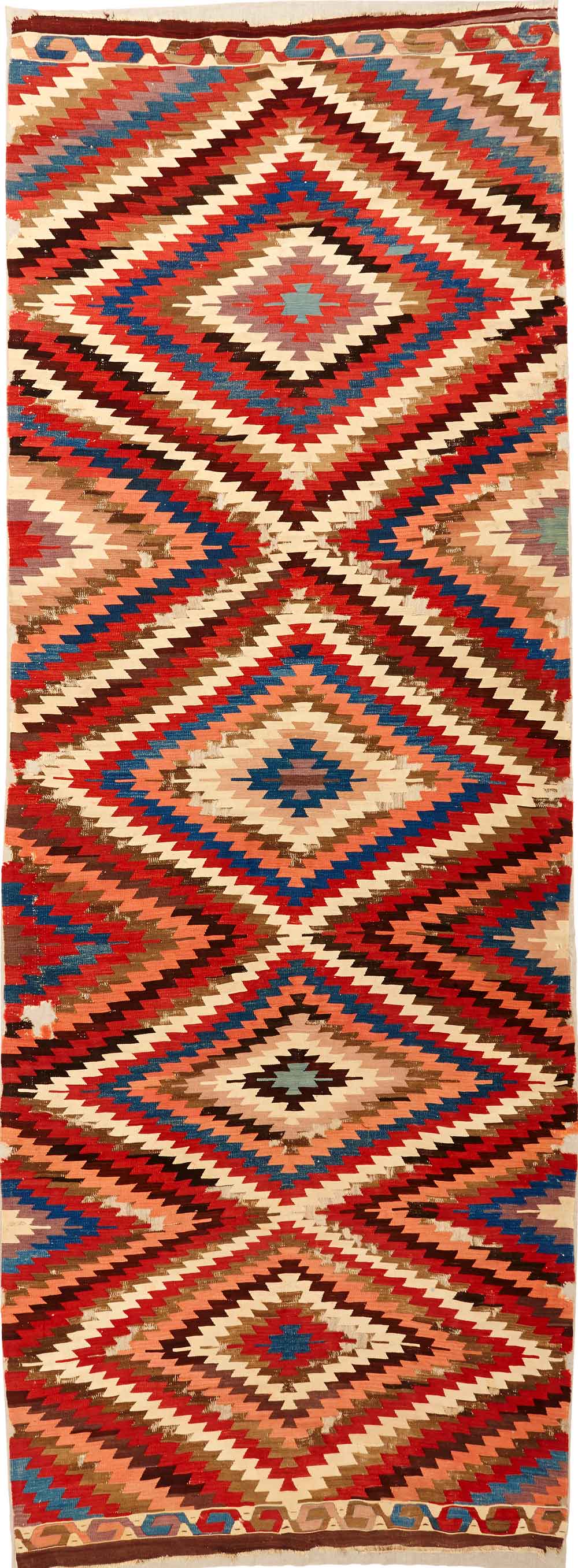 East-Anatolian kilim, 19th century, 154 x 400 cm. Despite its similarities with kilims from Western Anatolia and the Konya region, the  weaving structure and the colours of this piece link it with Eastern Anatolia. 100 Kilims, Neiriz Collection on view at Halle, Germany