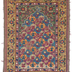 Azerbaijan Embroidery, Azerbaijan, first Half 19th century, 175 x 127 cm (5ft. 9in. x 4ft. 2in.); silk on cotton. Austrian Auctions, Vienna, 22 April, Lot: 95. Estimate: € 8.000 – 12.000. Silk embroideries from the southern Caucasus/Azerbaijan fall into two principle groups. The first, often related to rug designs like Dragon carpets, usually relatively abstract in style and done in cross stich and the second more floral, naturalistic and often depicting people and animals sewn using darning stitch. This example uses darning stitch and shows seated figures and peacocks meaning that it belongs to the second group which is in general more closely related to Iranian art. There seem to be fewer examples of this group published, many of which have designs containing mihrabs drawn in a distinct style. The design of the inner part of the mihrab in this piece is relatively unusual, since most examples with prayer arches show tree of life designs or flowers in vases. Other examples show medallions like in Lot 63 Christies 24.4.12, which has main and minor borders nearly identical to this example. Every flower in the main border has the same floral motif as the appears in the tail of the peacocks that surround the seated figures in the field. The black and white/yellow blocks in the outer and inner frame seem to be a feature of almost all examples of the darning stitch group.