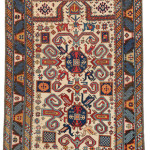 Perepedil Prayer Rug, Caucasus, first half 19th century Warp: wool, weft: wool, pile: wool. 137 x 96 cm (4ft. 6in. x 3ft. 2in.); Lot: 185, Austrian Auctions, Vienna, 22 April, Estimate: € 15.000 – 20.000. The origins of this design are disputed with one school of thought considering that the rams horn motifs have an ancient symbolic resonance, with the other school relating the designs to motifs found on Azerbaijan embroideries and classical carpets. There are a number of white ground Perepedil rugs with paired medallions surrounded by these powerful horned motifs all of which appear to be from early 19th century prior to the introduction of mass weaving in the Caucasus by the Russians in the late 19th century. This example is one of the few single niche prayers within the group and is characterised by the unusual rendition of the classic wine glass and calyx leaf border. The rug has two idiosyncratic qualities that set it part: the first is the pinched lower border where the lower border does not match perfectly the ascending vertical guard borders, and the way that the top of the prayer niche is cut off by the upper border.
