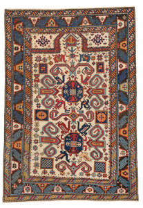Perepedil Prayer Rug, Caucasus, first half 19th century Warp: wool, weft: wool, pile: wool. 137 x 96 cm (4ft. 6in. x 3ft. 2in.); Lot: 185, Austrian Auctions, Vienna, 22 April, Estimate: € 15.000 – 20.000. The origins of this design are disputed with one school of thought considering that the rams horn motifs have an ancient symbolic resonance, with the other school relating the designs to motifs found on Azerbaijan embroideries and classical carpets. There are a number of white ground Perepedil rugs with paired medallions surrounded by these powerful horned motifs all of which appear to be from early 19th century prior to the introduction of mass weaving in the Caucasus by the Russians in the late 19th century. This example is one of the few single niche prayers within the group and is characterised by the unusual rendition of the classic wine glass and calyx leaf border. The rug has two idiosyncratic qualities that set it part: the first is the pinched lower border where the lower border does not match perfectly the ascending vertical guard borders, and the way that the top of the prayer niche is cut off by the upper border.