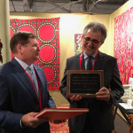 Bruce Baganz, chair of the Trustee of the Textile Museum at George Washington University, ,awards gallerist Mehmet Cetinkaya from Istanbul the Joseph V. McMullan Award for Stewardship and Scholarship in Islamic Rugs and Textiles, which is presented annually by The Near Eastern Art Research Center