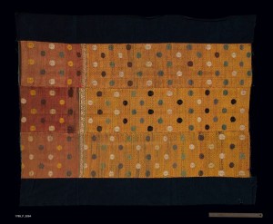 Blanket, China Maonan, Late 19th Century. 3' 10 3/4" x 4' 6" (118.7 x 137.2cm); Cotton, silk; continuous and discontinuous supplementary weft inlay. Blanket made of three strips of cotton warp/cotton weft fabric with continuous and discontinuous supplementary weft inlay in silk and two border strips of tabby woven cotton cloth. Roger Hollander Collection - Primary collection
