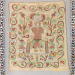 AN EMBROIDERED FIGURAL TEXTILE FRAGMENT