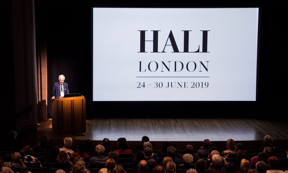 Michael Franses, HALI Chairman and Editor Emeritus, offering opening remarks and welcome at day 2 of the HALI Symposium, 'Making the Past Present: Collecting and Collections of Antique Carpets and Textiles', at the National Gallery. 