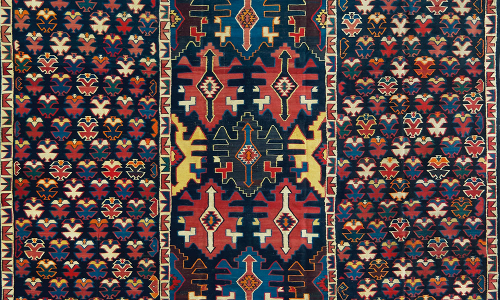 Shirvan kilim (detail), east Caucasus, 19th century (?). Wool, slit-tapestry weave, 3.11 x 4.86 m (10' 3" x 15' 0"). Wincor collection 2  Shadda, Karabagh region, southwest Caucasus, early 19th century. Wool with cotton highlights, supplementary weft weave on plainwoven foundation, 1.65 x 2.83 m (5' 5" x 9' 3" ). Wincor collection
